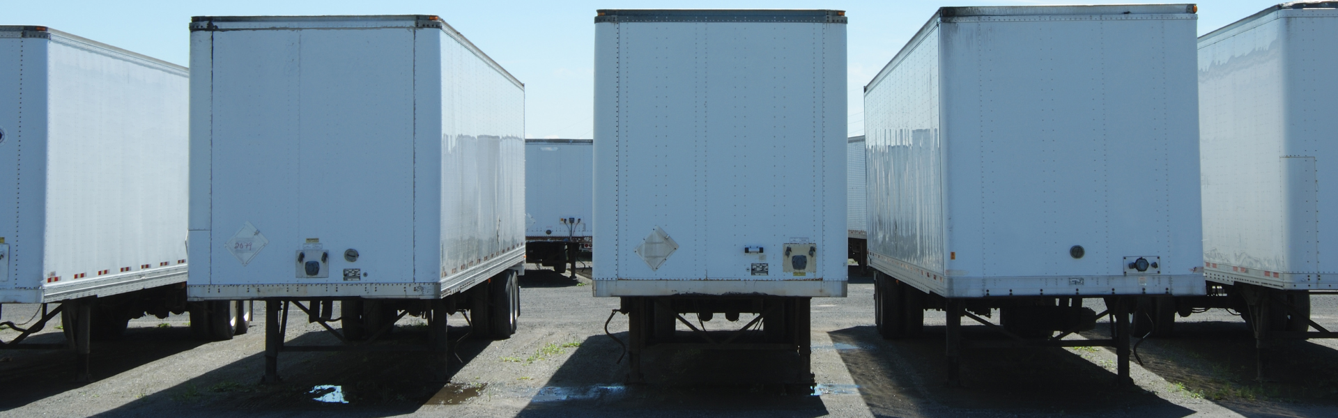 Optimizing Freight Logistics with Drop-and-Hook and Trailer Pool Strategies
