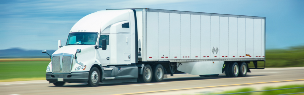 white semi truck on road