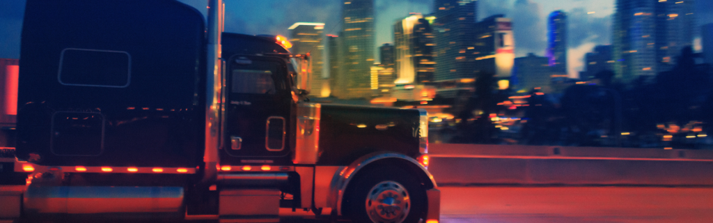 semi truck driving at night