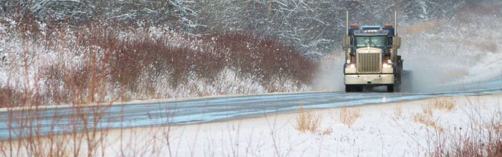 semi truck on snowy road