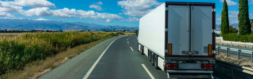semi truck driving on road