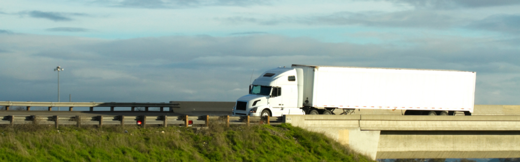 white semi truck on road