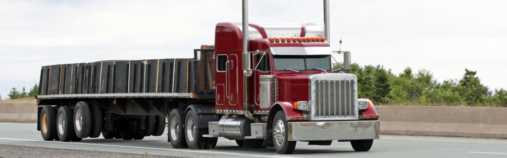 red flatbed semi truck