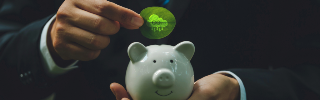piggy bank being filled with carbon emissions