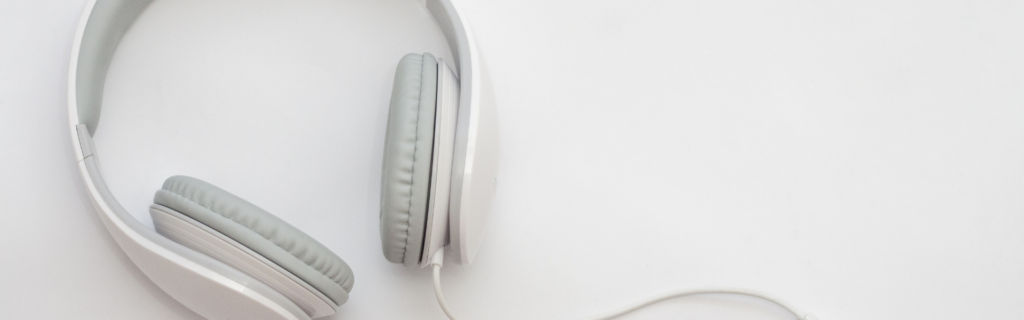 white corded headphones with grey ear pads
