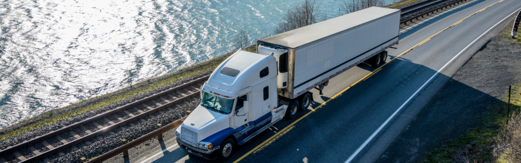 reefer semi truck on coastal highway