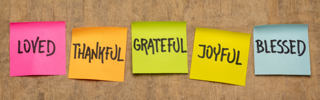 colorful post it notes with the words, loved, thankful, grateful, joyful, and blessed written on them
