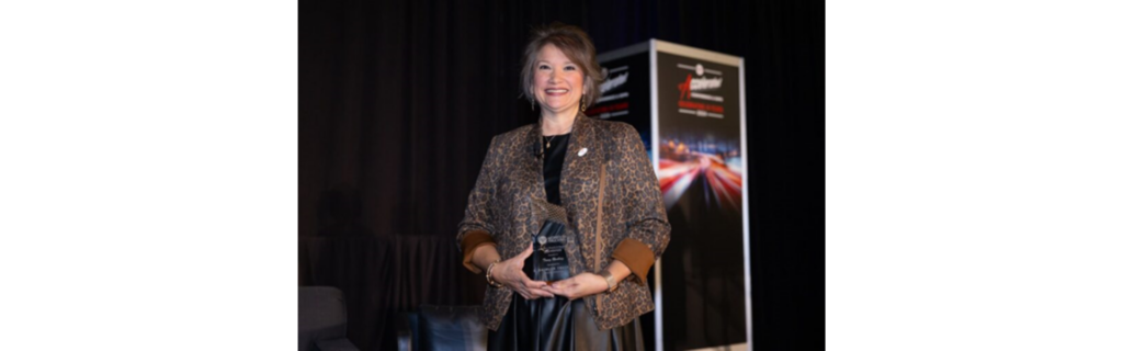 Tracy Rushing, Executive Director of Safety and Recruiting at RE Garrison Trucking Inc., is celebrated as WIT's 2024 Influential Woman in Trucking.